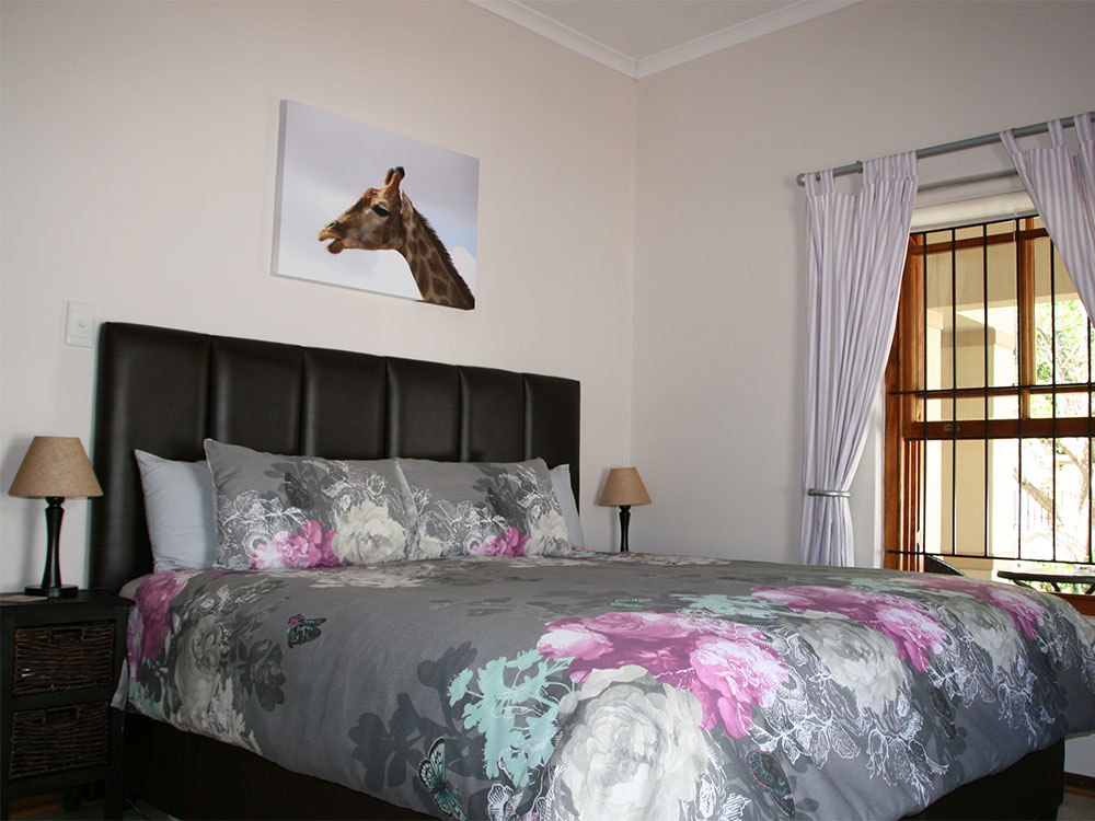 Südafrika: Ferienhaus Perle unter der Sonne, Schlafzimmer mit Kingsize-Bett